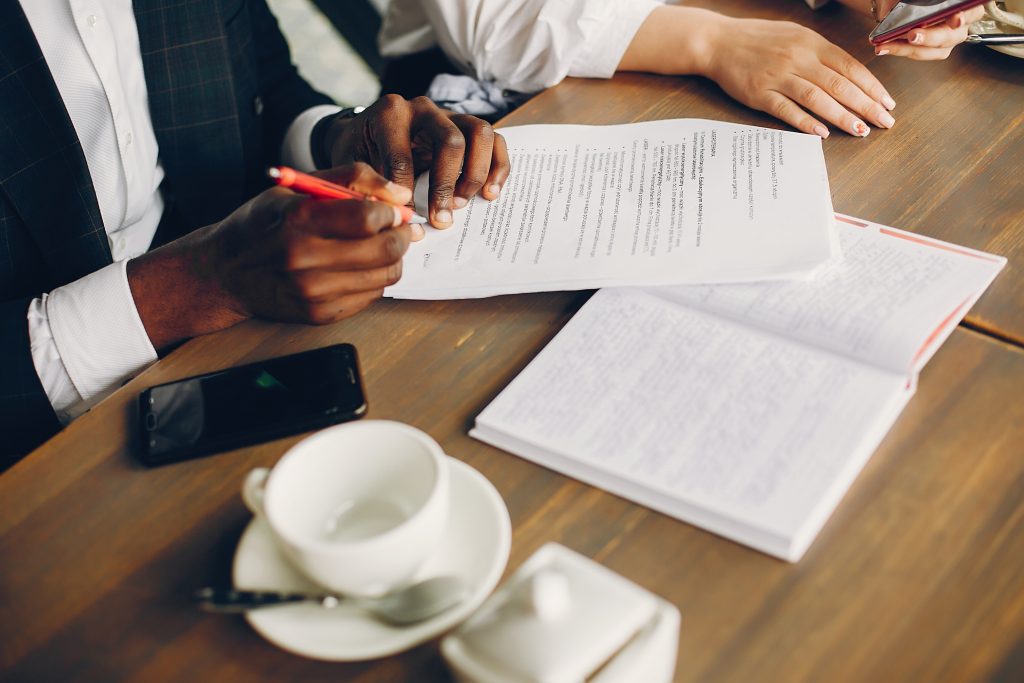 business man signing document